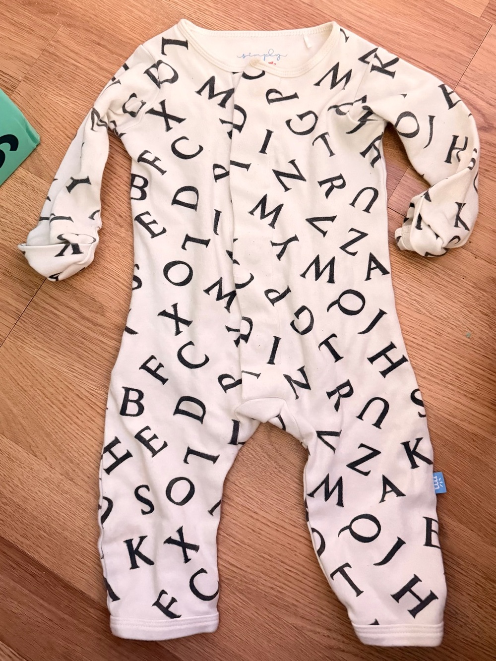 Magnetic Me Cream and Black Alphabet Footie One-Piece